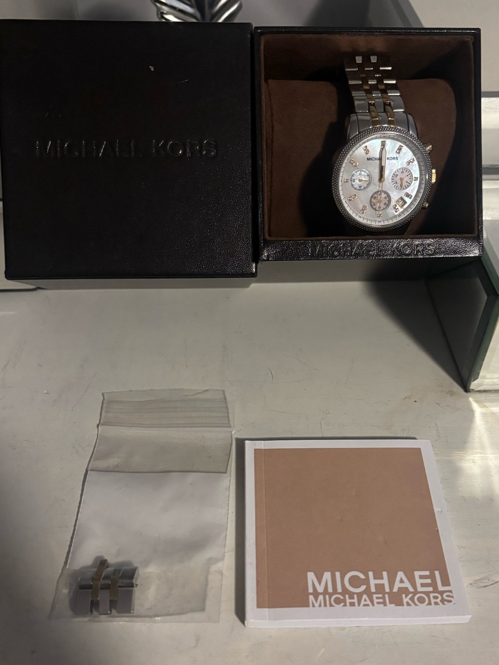 Gold and silver Michael Kors watch